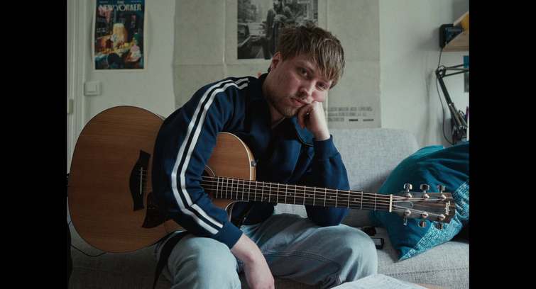 Image de Max et sa guitare